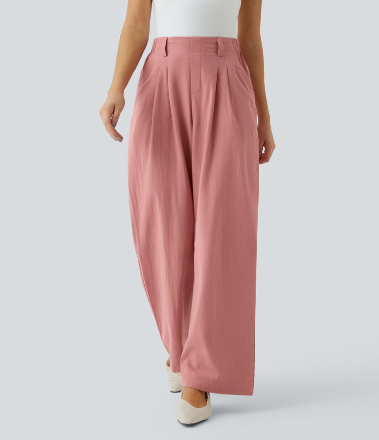 Pleated, flowing palazzo pants with a linen feel, side pockets, and wide legs.